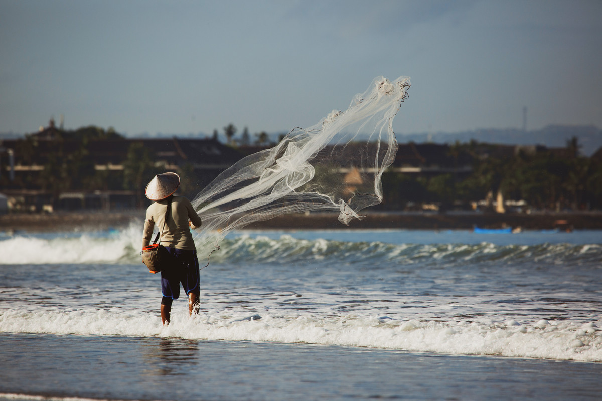 man-is-fishing-with-net.jpg