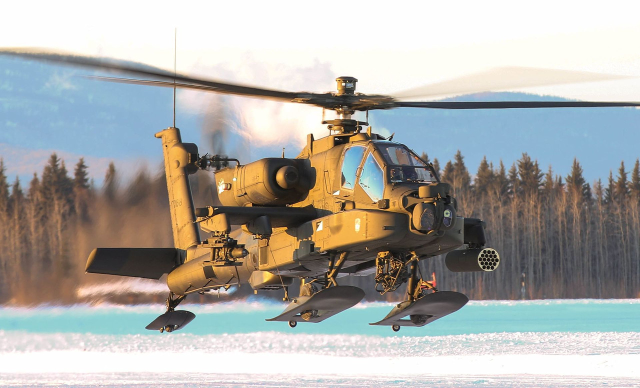 1920px-AH-64-Apache-conducting-pilot-certification-training-Fort-Wainwright.jpg